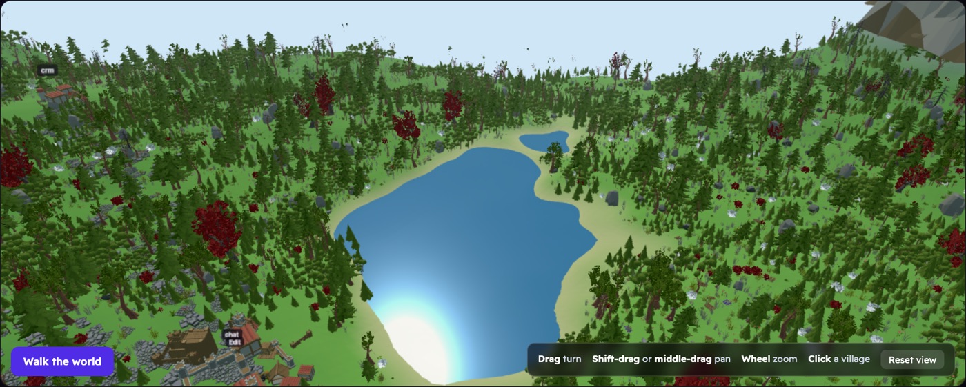 The valley from a lower angle, looking
        across water towards wooded hills and distant mountains.